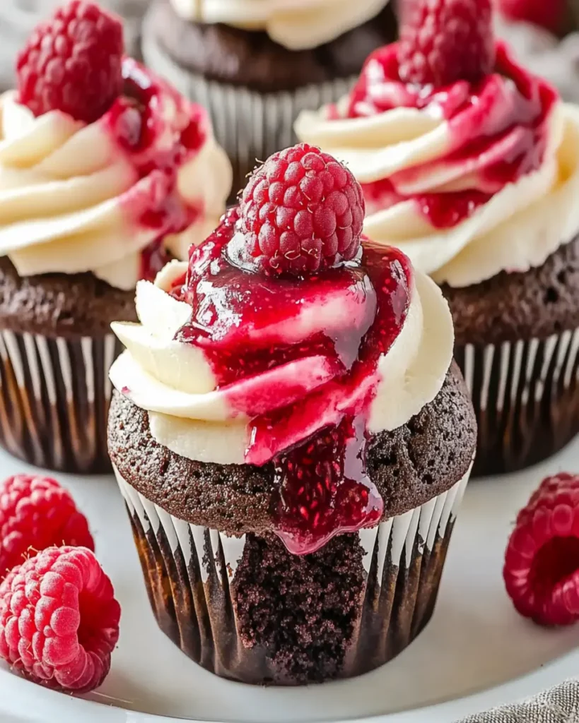 RASPBERRY CHEESECAKE CHOCOLATE CUPCAKES you’ll love! First Image First Image